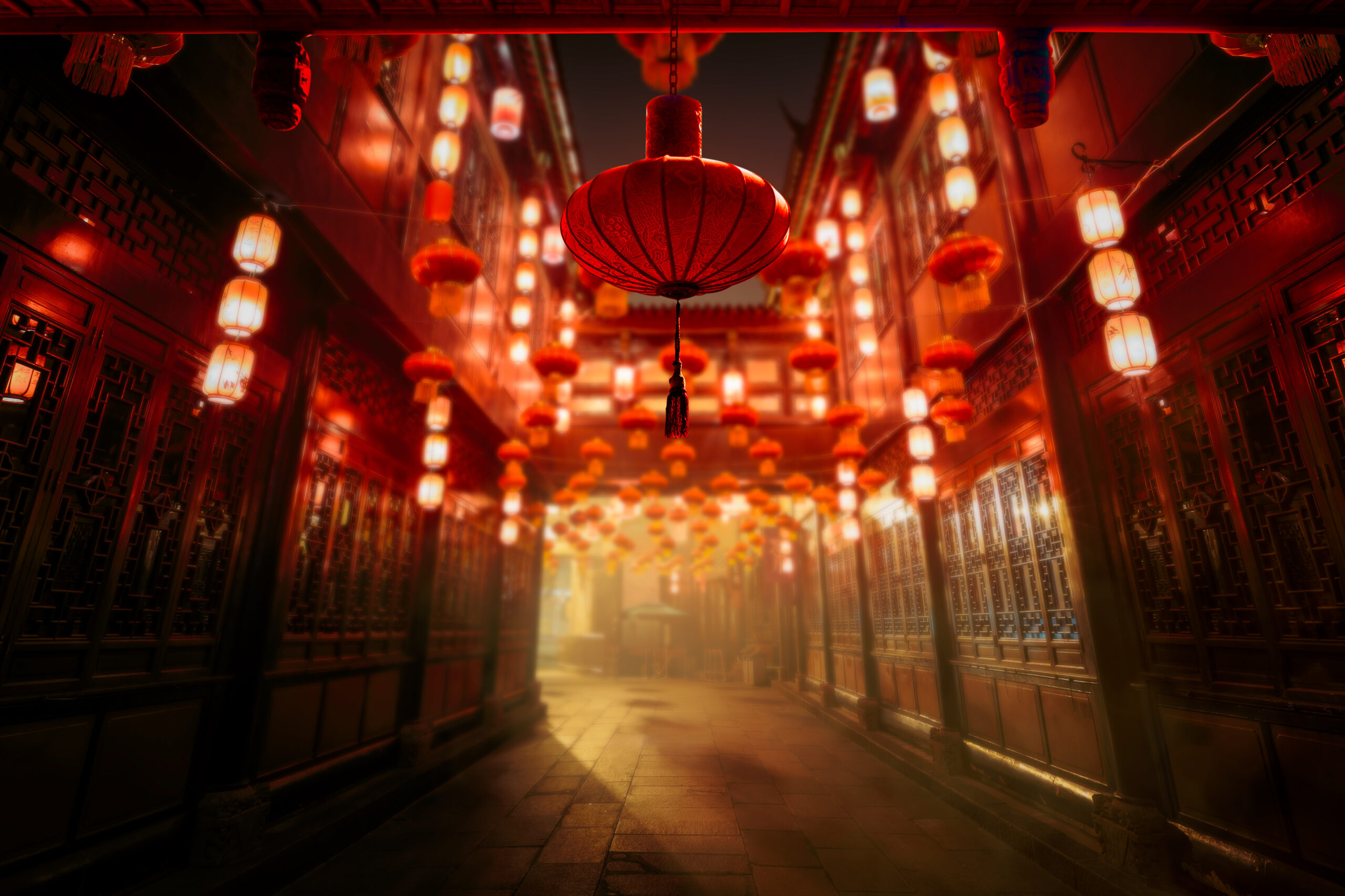 Illuminated by vibrant red lanterns, a traditional street captures the festive spirit of the Lunar New Year a time for fresh beginnings and entrepreneurial dreams.