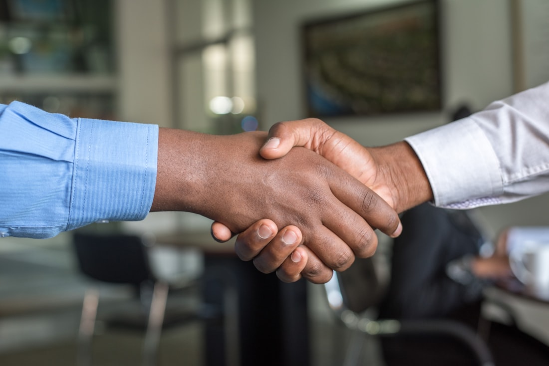 Business handshake signalling trust