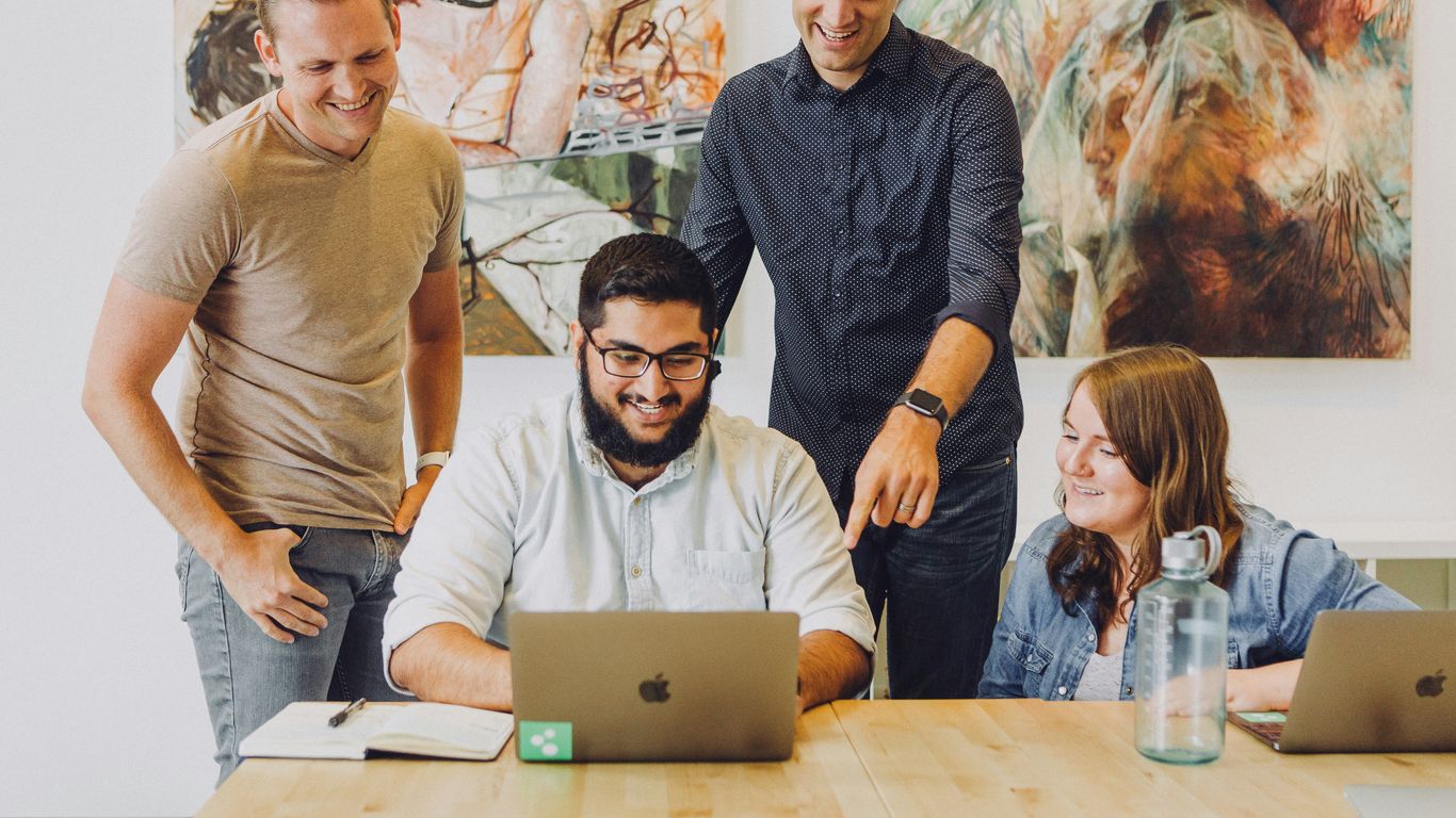A diverse team working on a project strategy